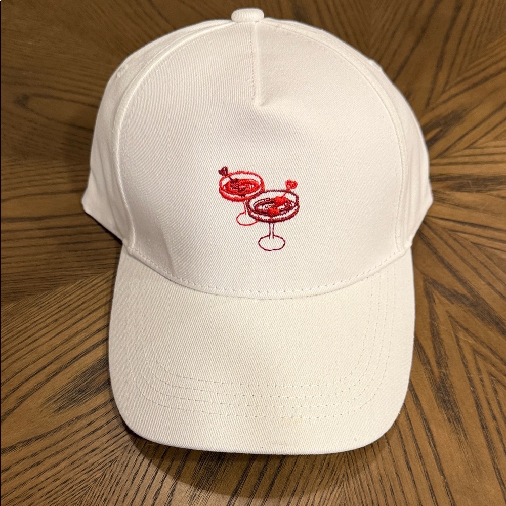 Francesca's White Cotton Baseball Cap with Black Tag Accent